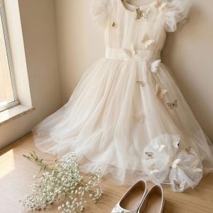 9 Enchanting Flower Girl Dresses | Ivory Tulle Butterfly Dress with Ruffle Sleeves